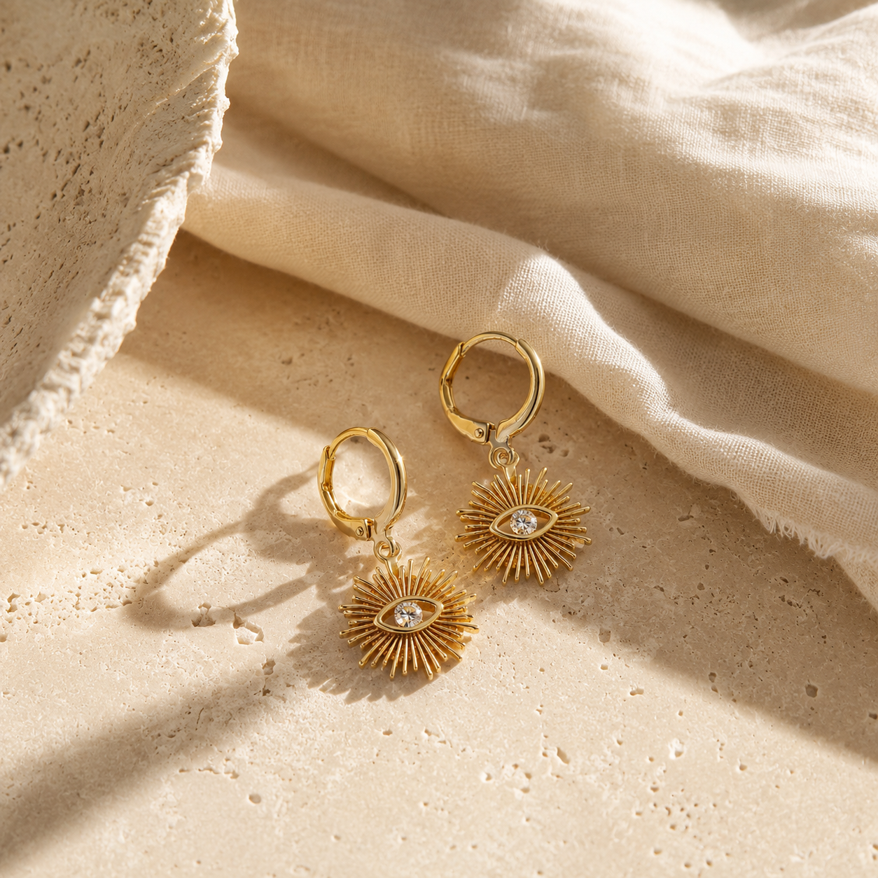 Golden Eye Huggie Earrings